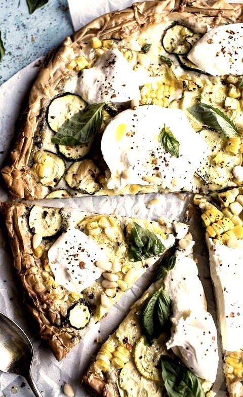 Zucchini and roasted sweet corn provolone phyllo pizza with truffle oil